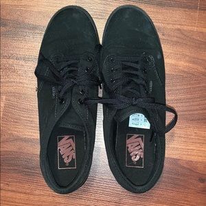 Women’s all black Vans
